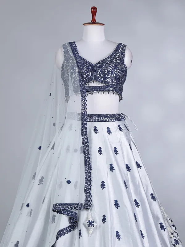 Navy and silver raw silk lehenga choli with net dupatta
