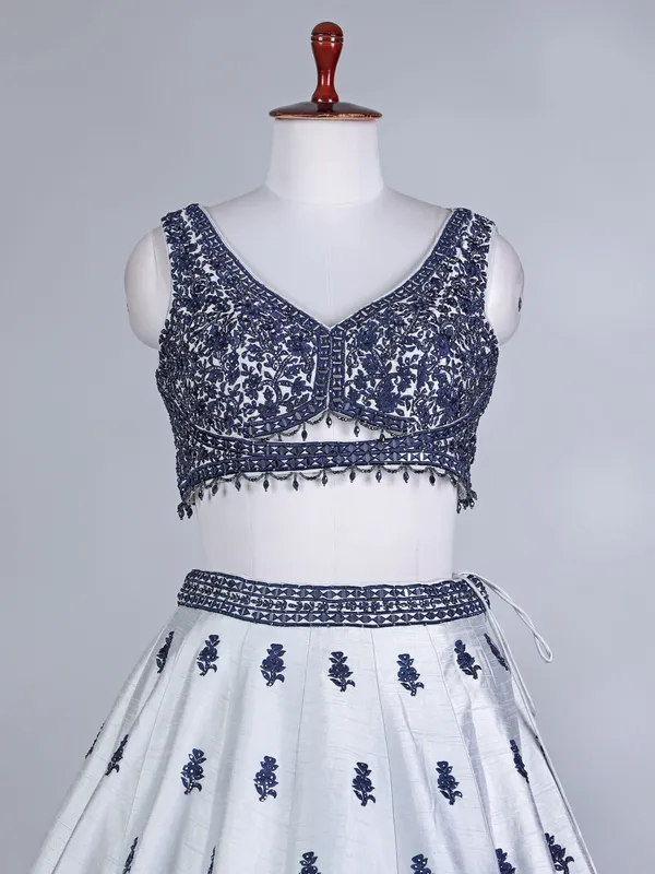 Navy and silver raw silk lehenga choli with net dupatta