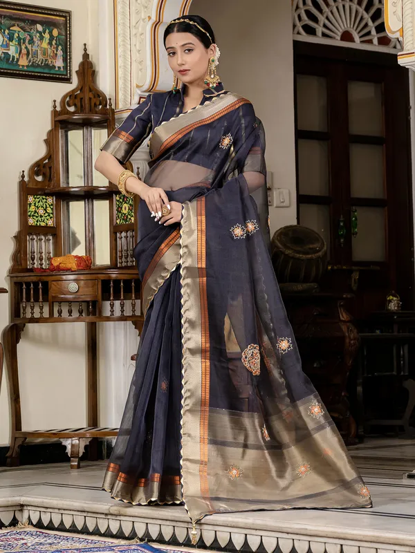 Navy blue linen saree with elegant zari weaving