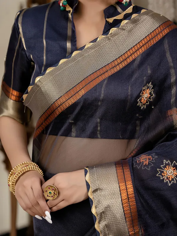 Navy blue linen saree with elegant zari weaving
