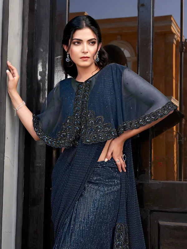 Navy blue net saree with embellished jacket blouse