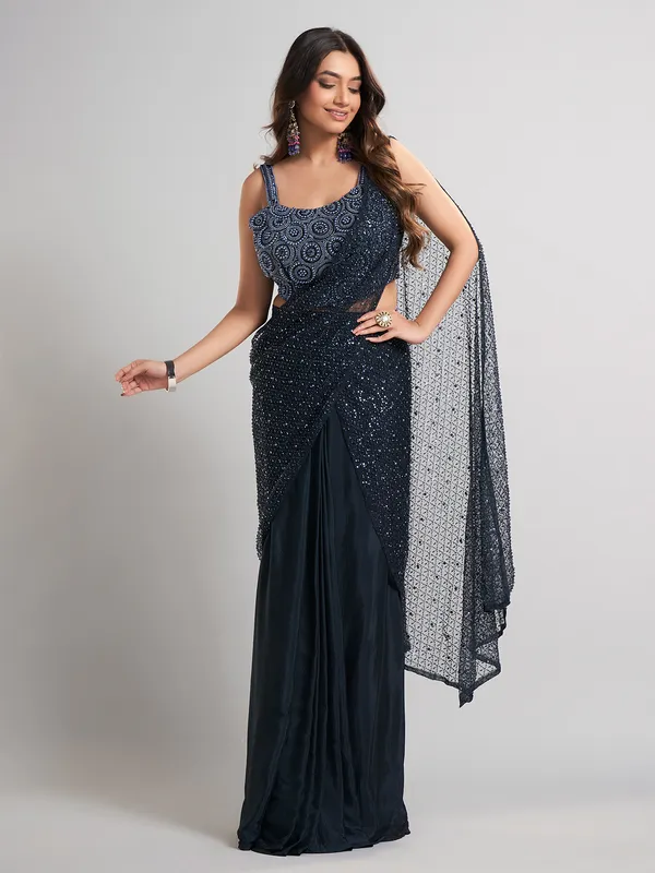 Navy blue party wear saree in lycra andnet with glam detailing