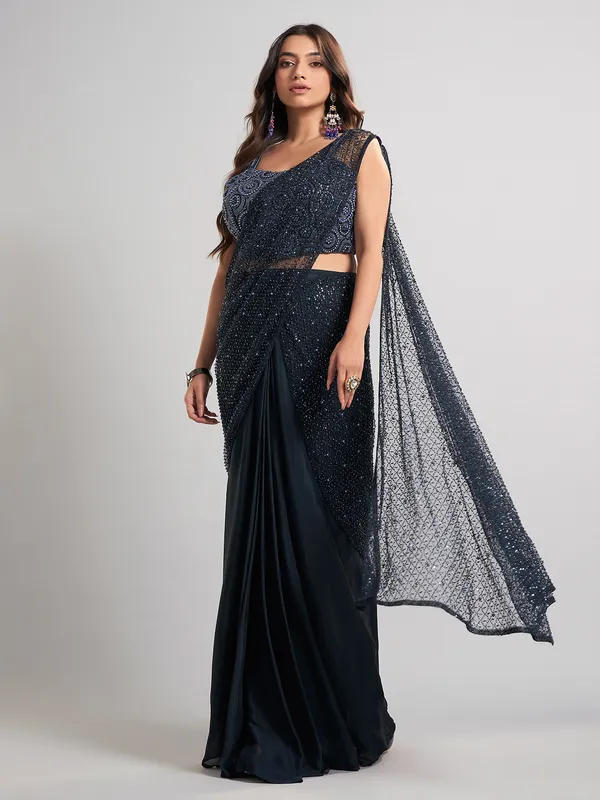 Navy blue party wear saree in lycra andnet with glam detailing