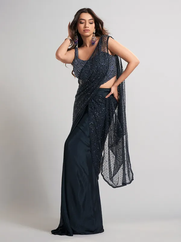 Navy blue party wear saree in lycra andnet with glam detailing