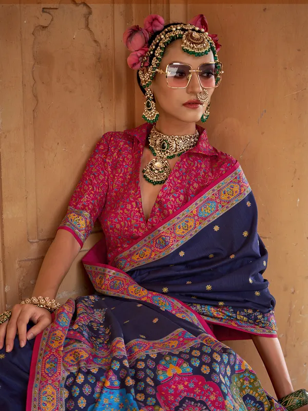 Navy blue silk saree featuring traditional printed motifs