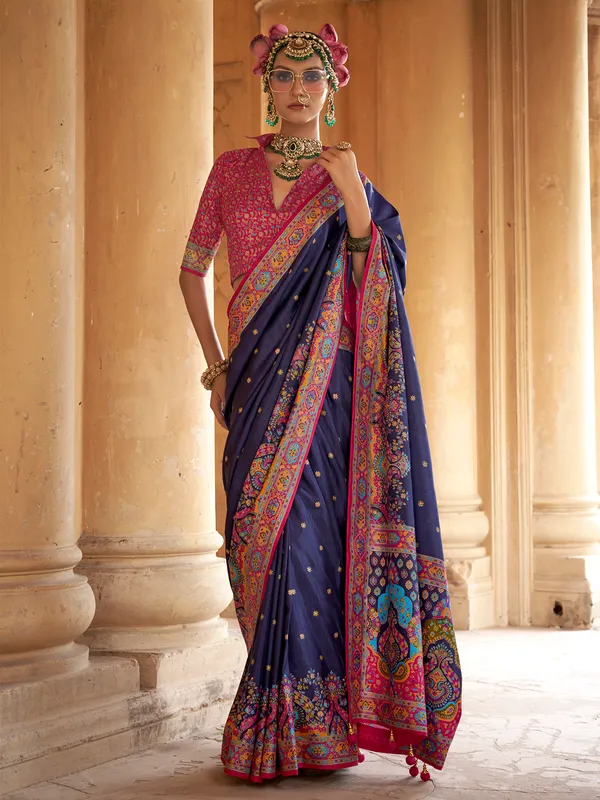 Navy blue silk saree featuring traditional printed motifs