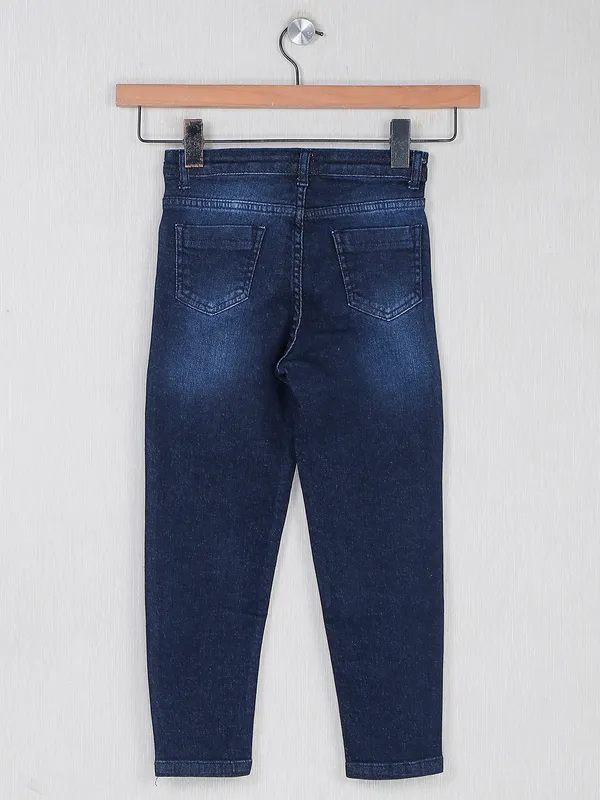 Navy denim washed and ripped style jeans