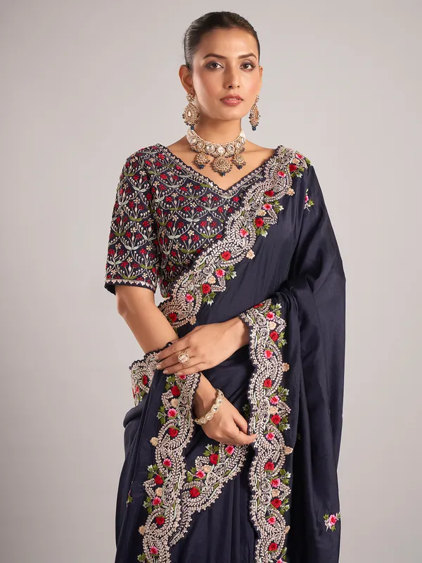 Navy pure dola silk saree with elegant embroidery