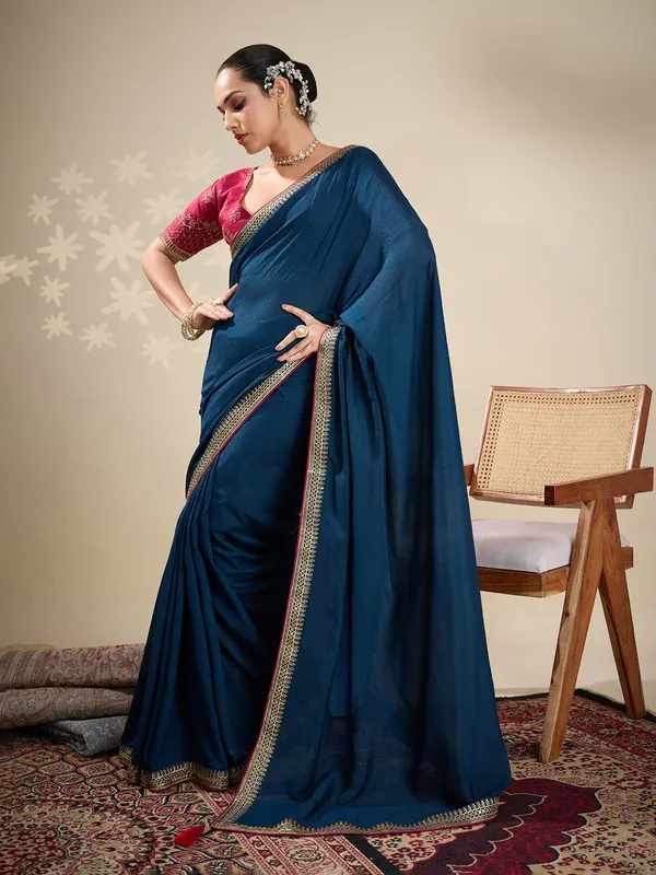 Navy silk plain saree with embellished border