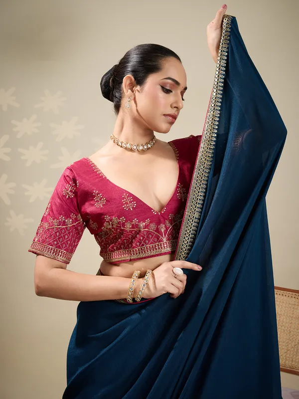 Navy silk plain saree with embellished border