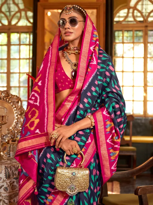 Navy silk saree with contrast magenta border