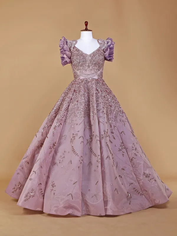 Net designer gown in mauve purple