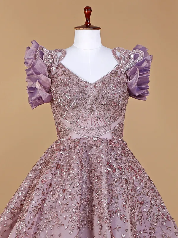 Net designer gown in mauve purple