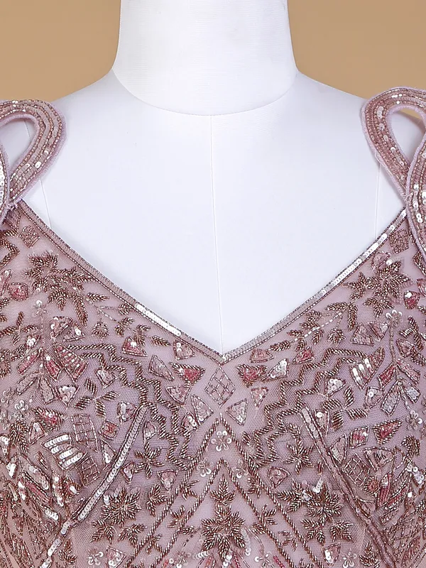 Net designer gown in mauve purple