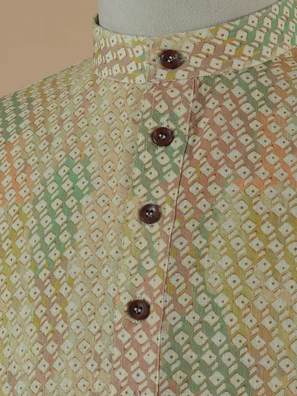 Yellow printed kurta suit for festive
