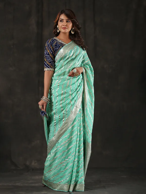 Newest sea green georgette saree