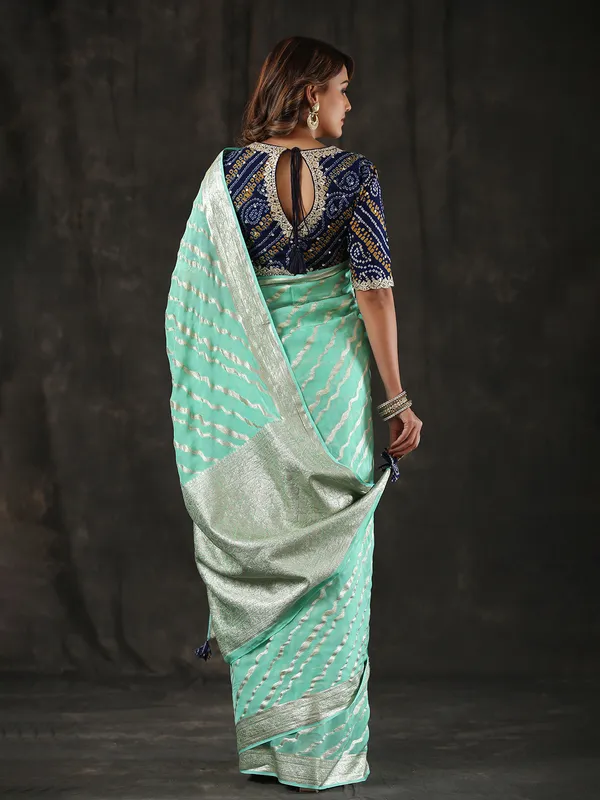 Newest sea green georgette saree