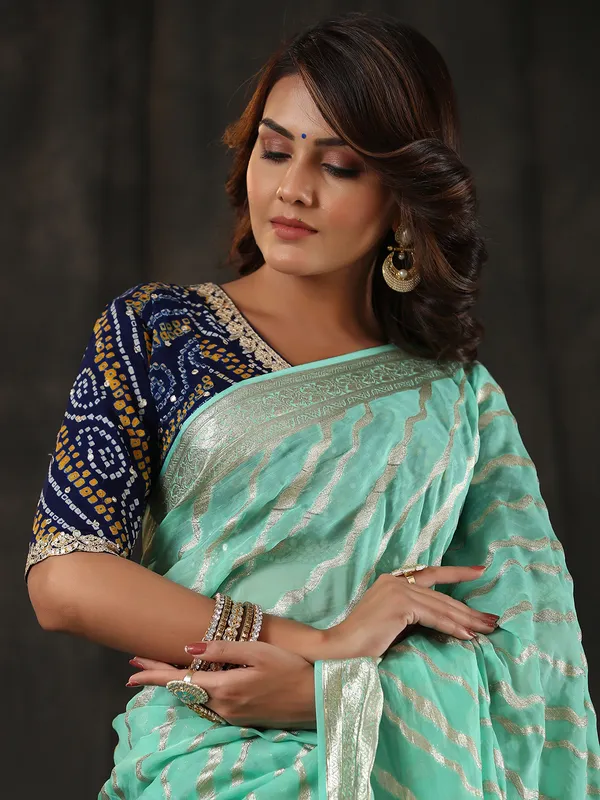 Newest sea green georgette saree