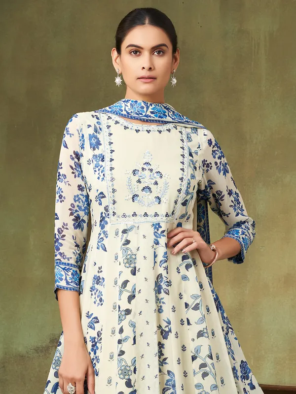 Off white and blue floral silk salwar suit with dupatta
