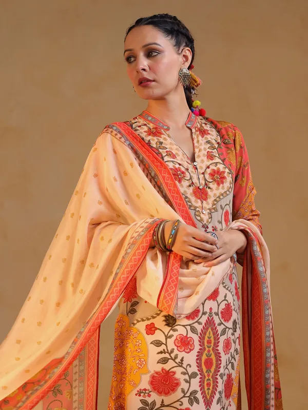 Off white and orange printed silk salwar suit