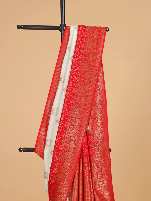 Off-white and red patola silk saree for wedding wear