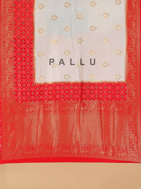 Off-white and red patola silk saree for wedding wear