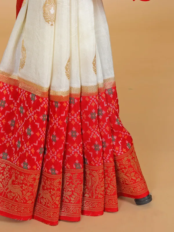 Off-white and red patola silk saree for wedding wear