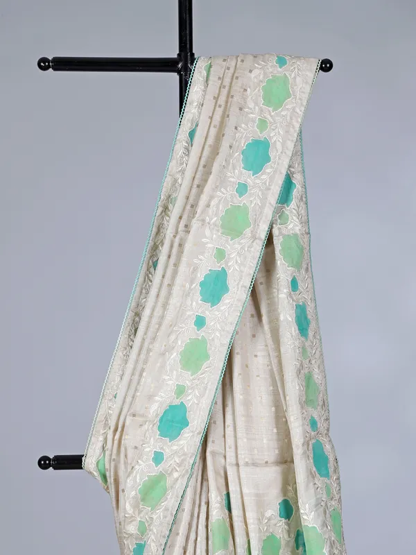 Off white blue semi silk saree with zari and embroidery touch