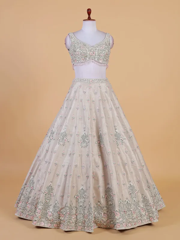 Off white bridal lehenga choli in raw silk