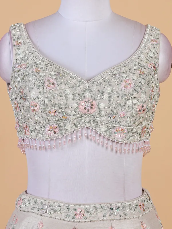 Off white bridal lehenga choli in raw silk