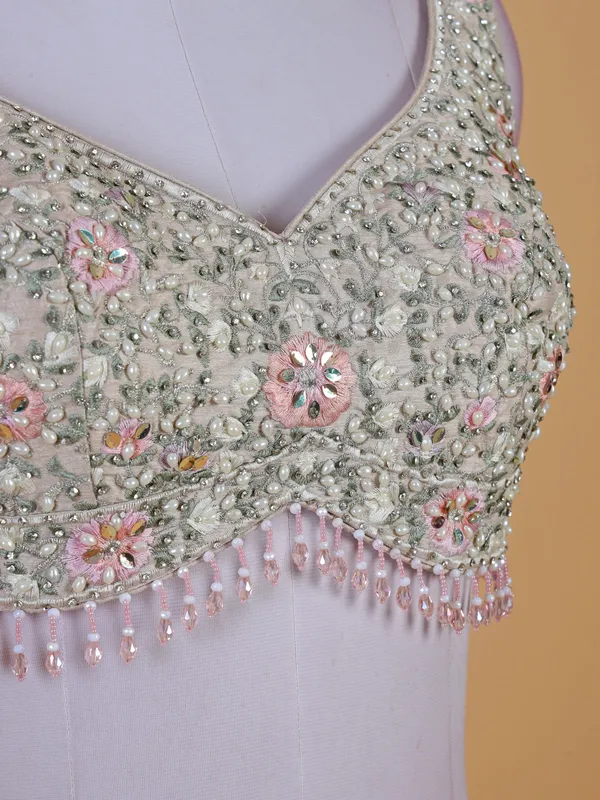 Off white bridal lehenga choli in raw silk