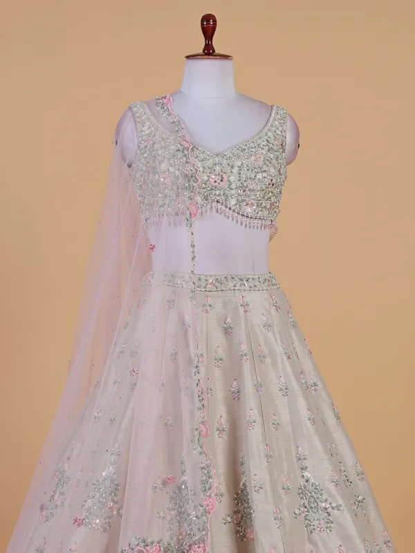 Off white bridal lehenga choli in raw silk