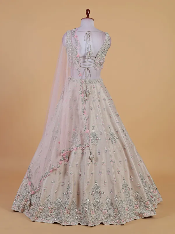 Off white bridal lehenga choli in raw silk