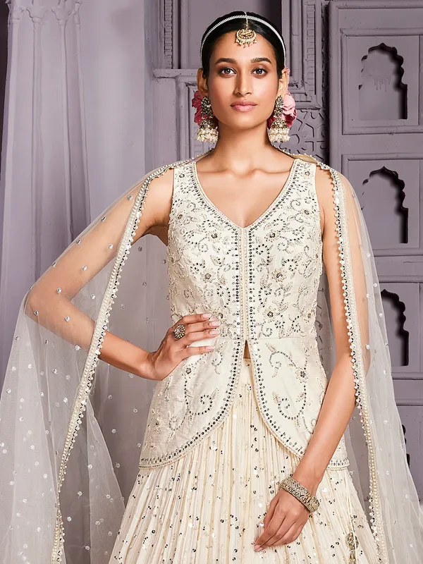 Off white chinnon lehenga with ready made blouse