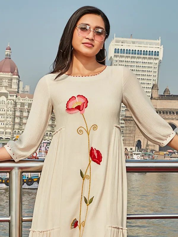Off white cotton floral embroidery kurti