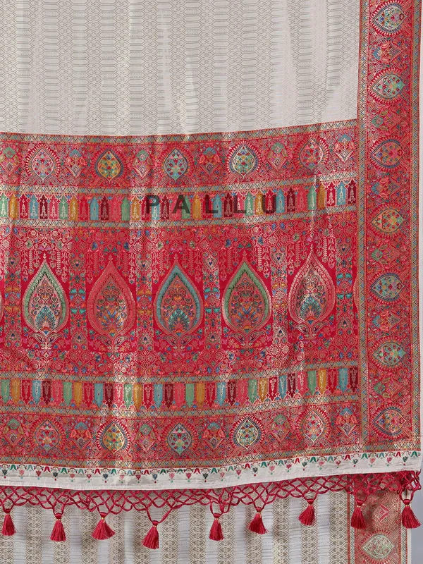 Off white dola silk saree with colorful motifs