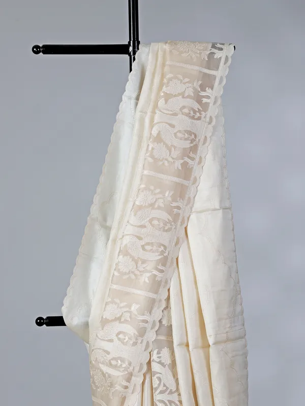 Off white embroidered tusser silk saree for reception