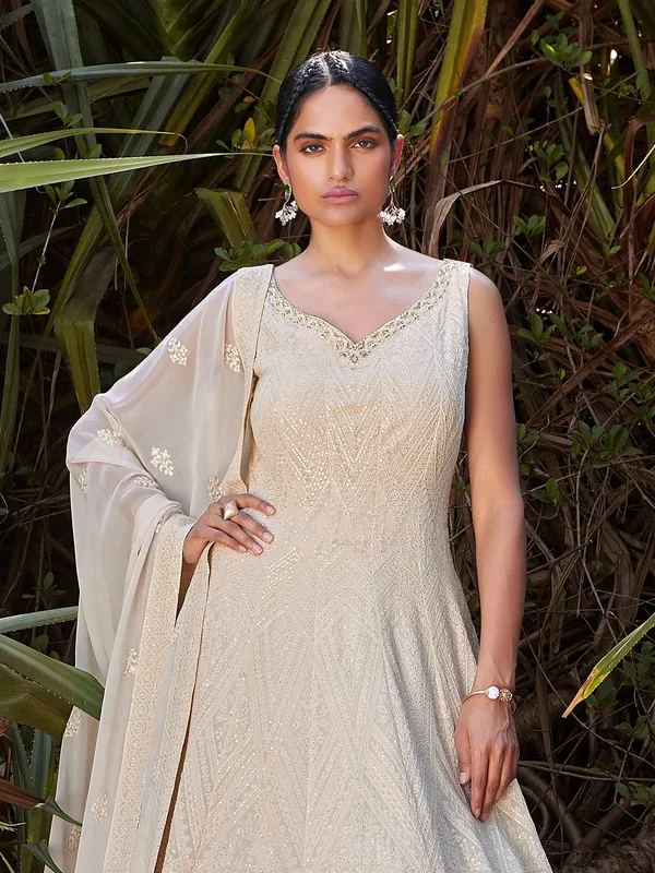 Off white floor length anarkali suit in georgette