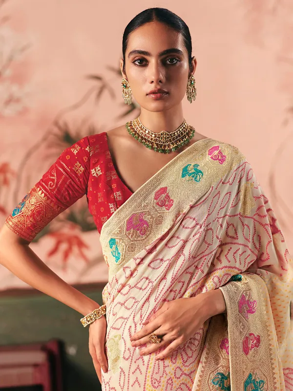 Off white georgette bandhej zari weaving saree
