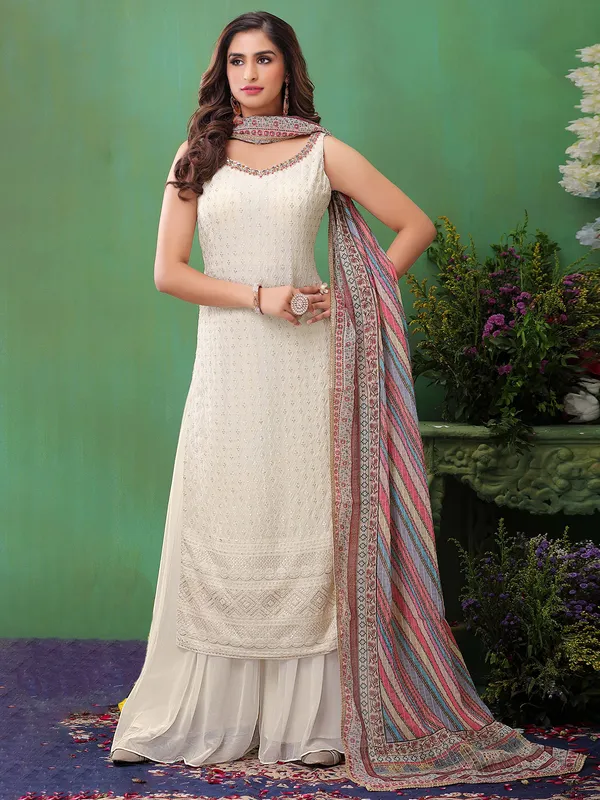 Off white georgette festive look palazzo suit