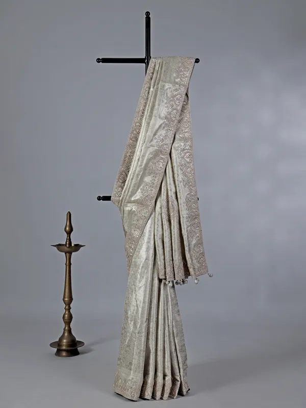 Off white kanjivaram silk saree with zardosi detailing