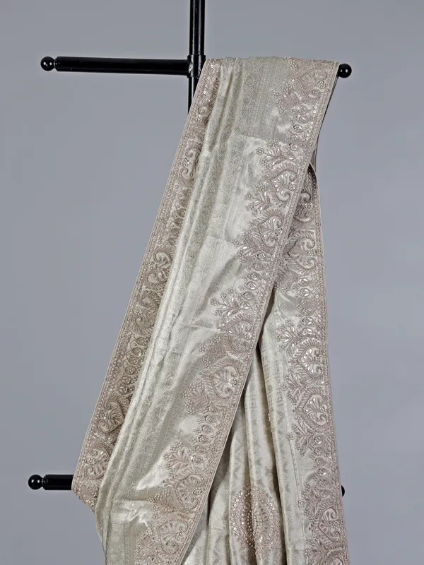 Off white kanjivaram silk saree with zardosi detailing