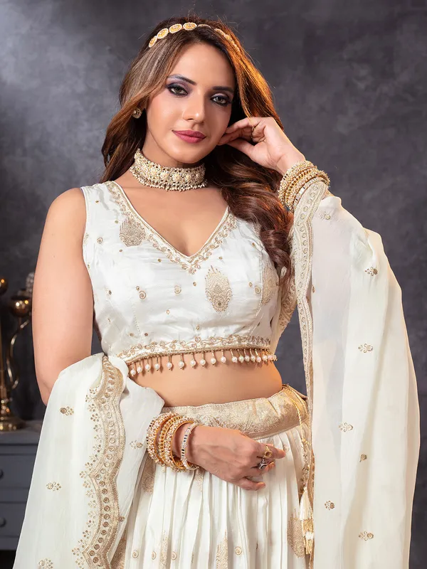 Off white lehenga choli in crepe silk fabric