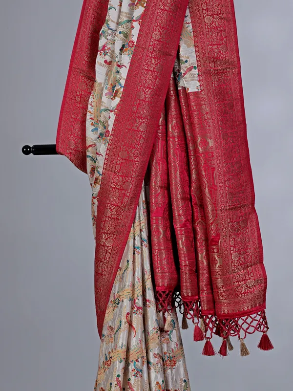 Off white masru silk saree with colorful motifs