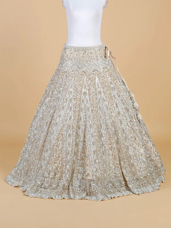 Off white net lehenga choli for bridal