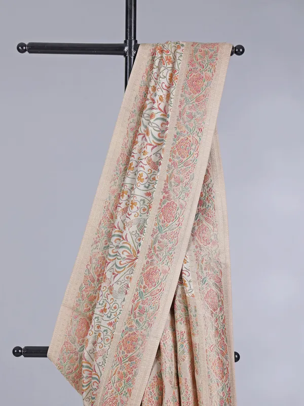 Off white pashmina silk saree with colorful motifs