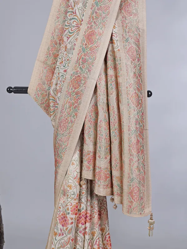 Off white pashmina silk saree with colorful motifs