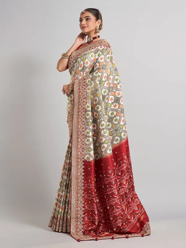 Off-white patola silk saree for wedding elegance