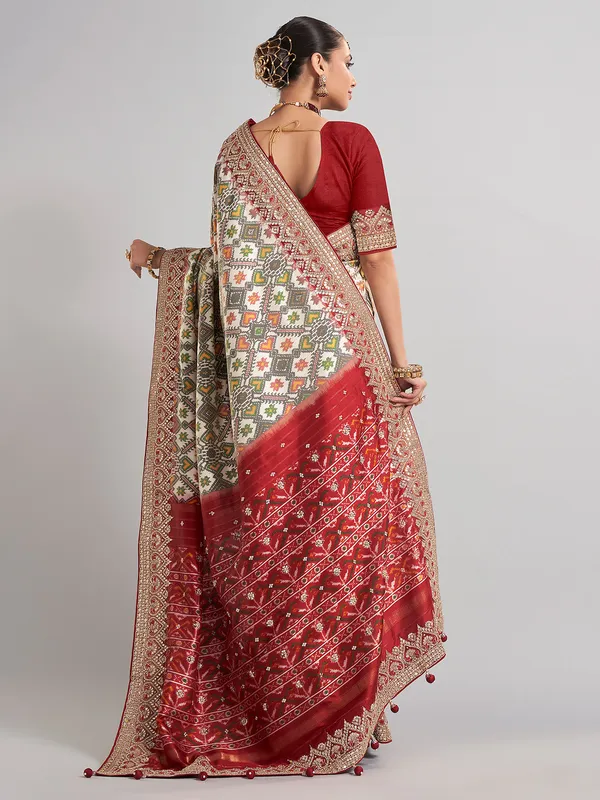 Off-white patola silk saree for wedding elegance