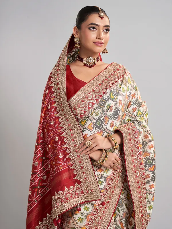 Off-white patola silk saree for wedding elegance